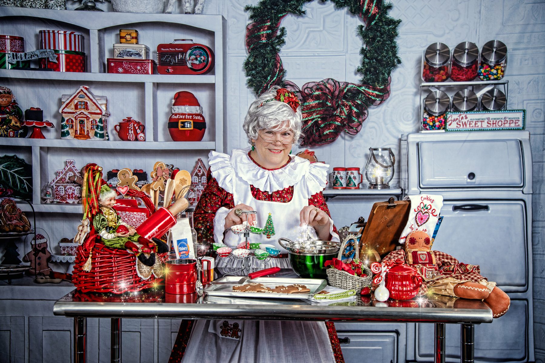 Santa and Mrs. Claus in professional Christmas attire